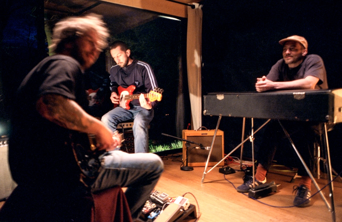 Gotts Street Park playing instruments in a recording studio, photographed by Alexandra Waespi.